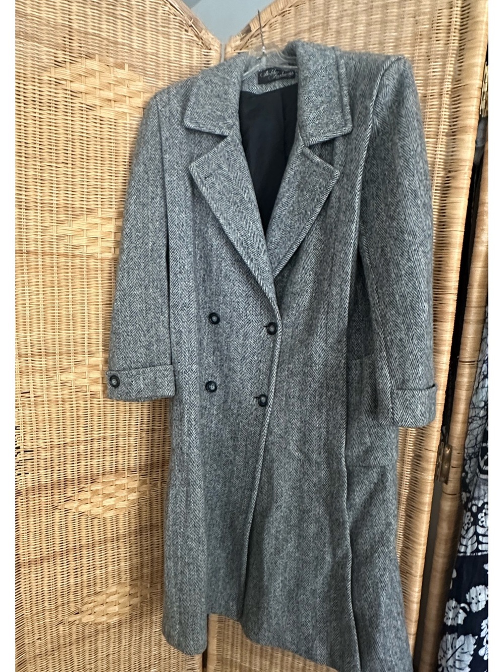 Double breasted houndstooth wool coat.